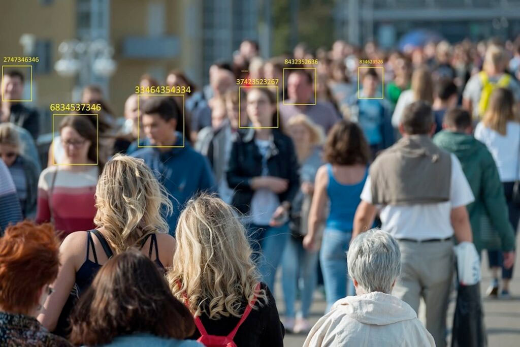scanning a crowd of people with facial recognition in order to stop threats or spot wanted persons